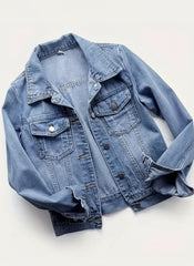 Blue denim jacket on a white background