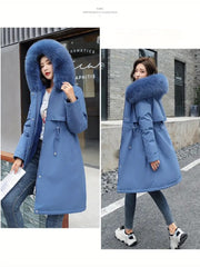 Woman wearing a blue coat with a fur-lined hood in two different settings.