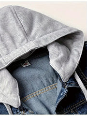 Close-up of a denim jacket with a gray hood on a light background