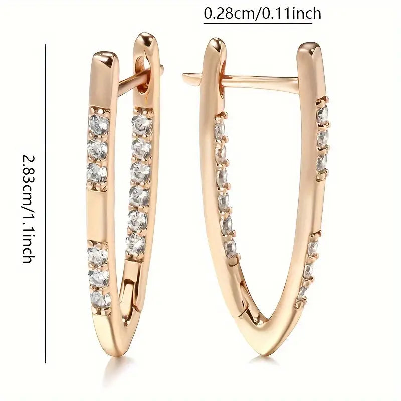 Rose gold hoop earrings with diamond accents and measurements on a white background