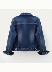 Blue denim jacket on a white background