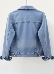 Blue denim jacket on a white background